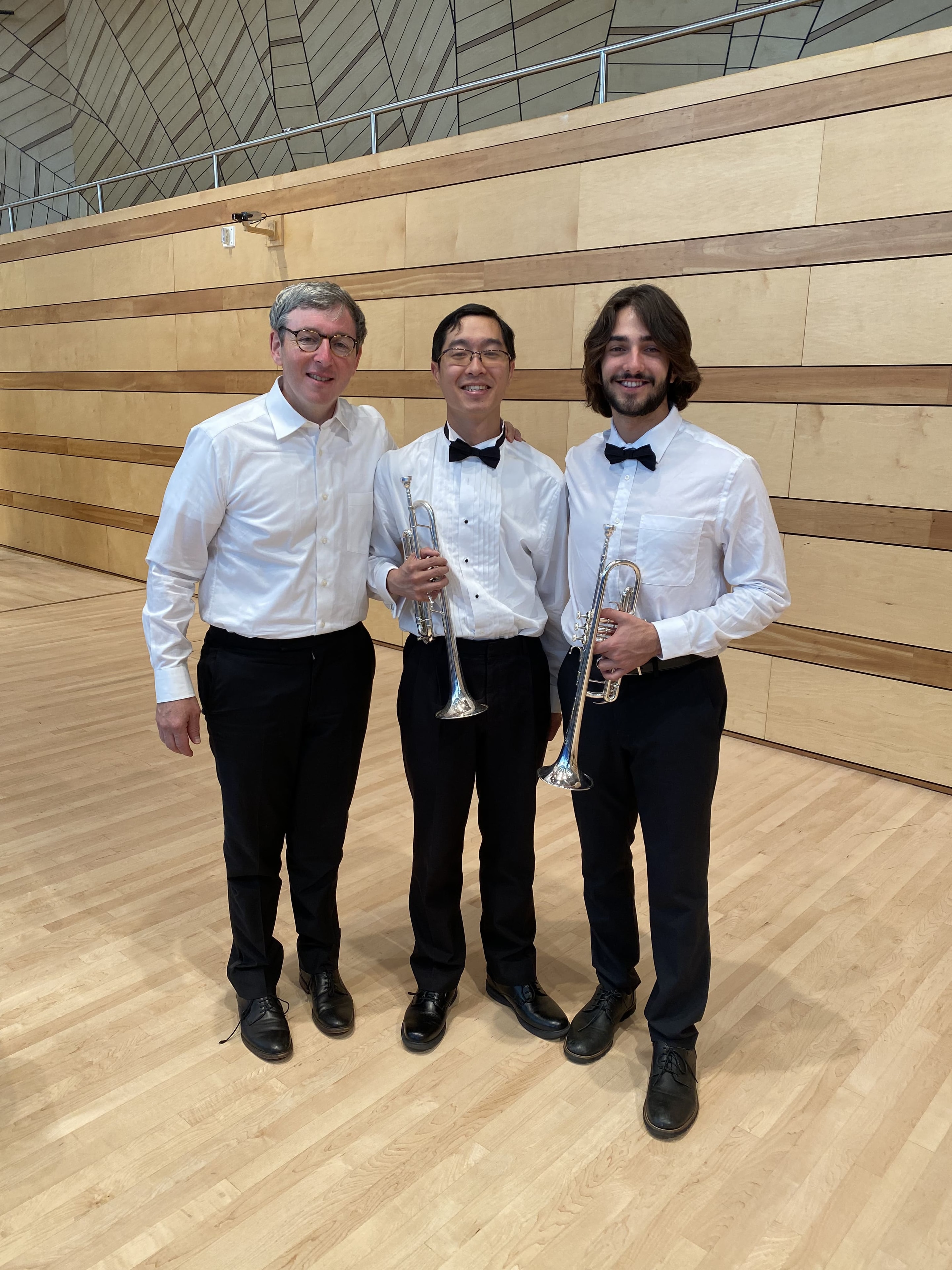 With mentor David Krauss and trumpeter Cleon Chai at Aspen Music Festival (and in need of a haircut!)